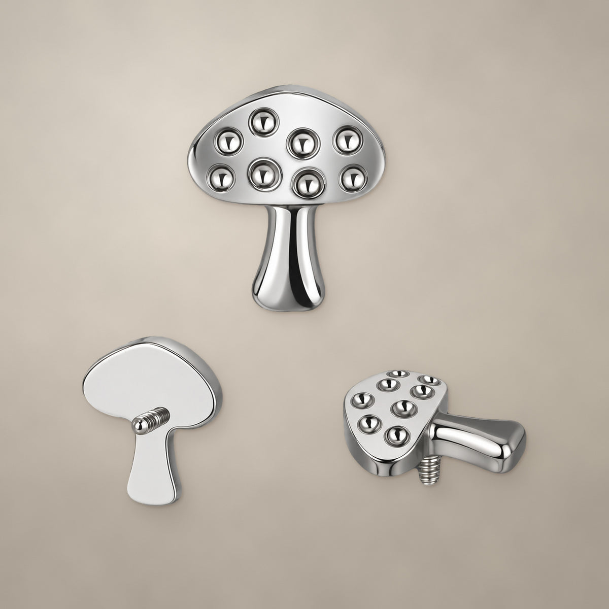 Mushroom internally threaded end in titanium, shown from three angles