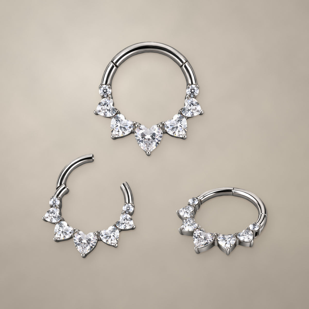Heart garland titanium clicker ring (8 mm), shown from three angles
