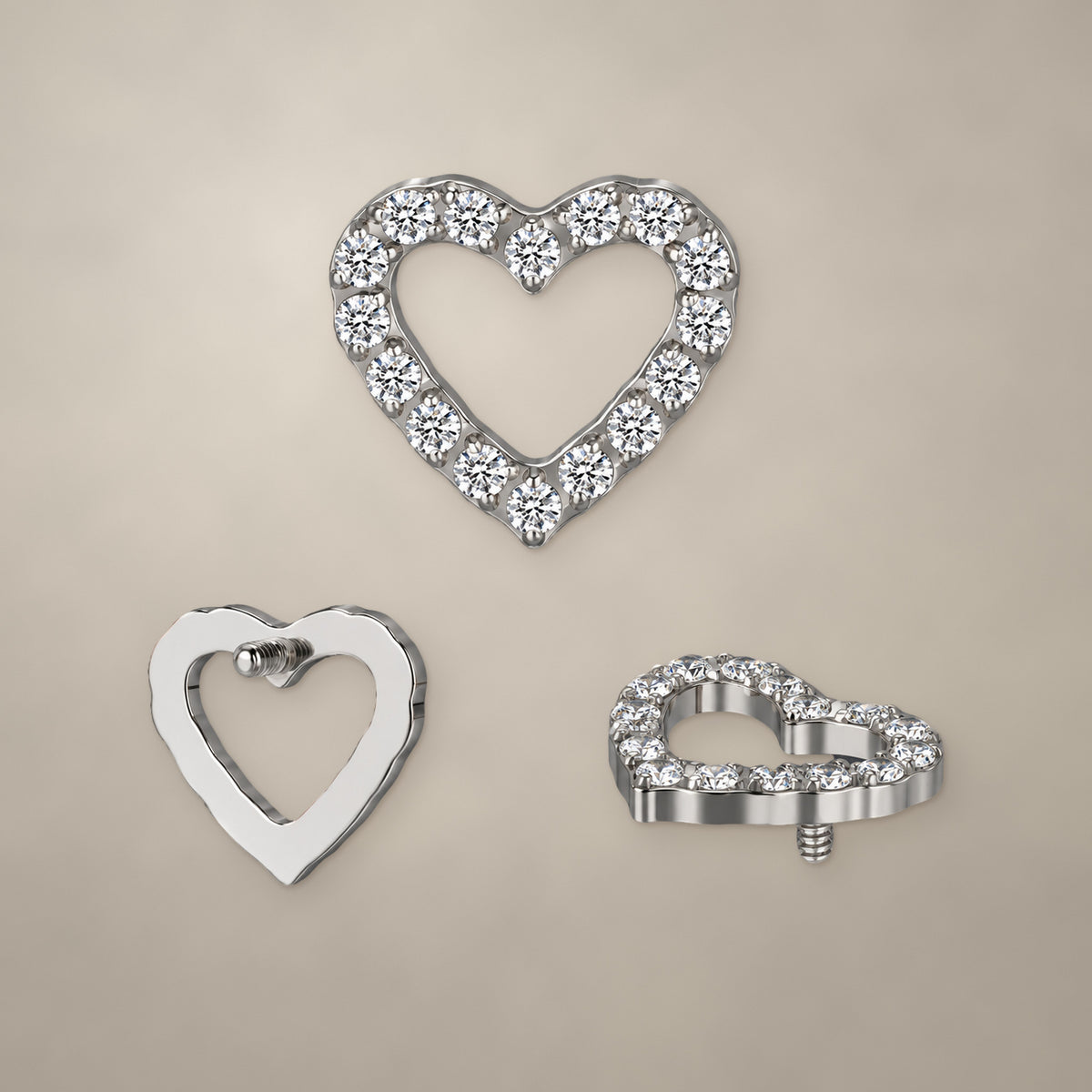 Open heart internally threaded end in titanium, shown from three angles