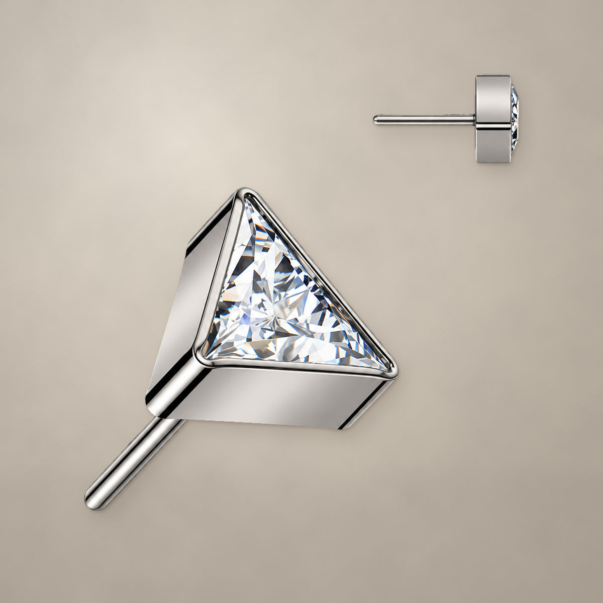 Triangle threadless end in titanium, shown from two angles