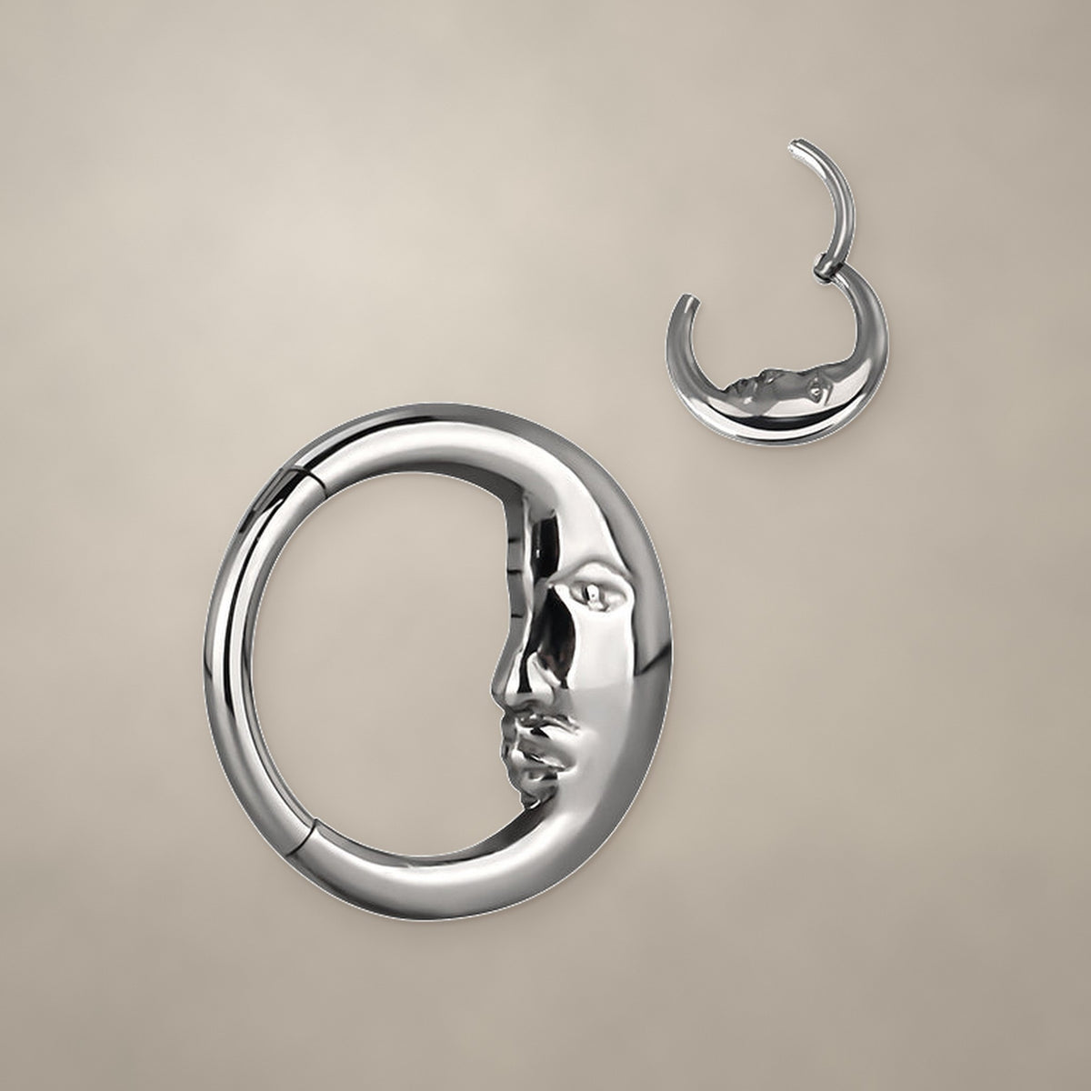 Crescent titanium clicker ring (8 mm), shown from two angles