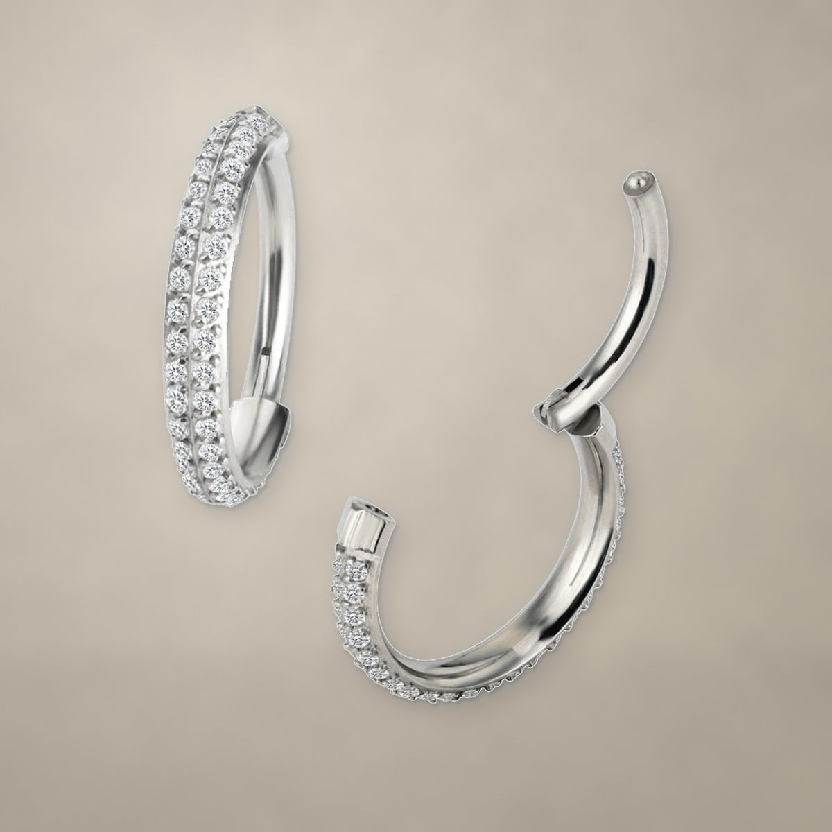 Double stone row titanium clicker ring (10 mm), shown from two angles