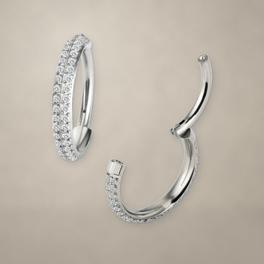 Double stone row titanium clicker ring (10 mm), shown from two angles