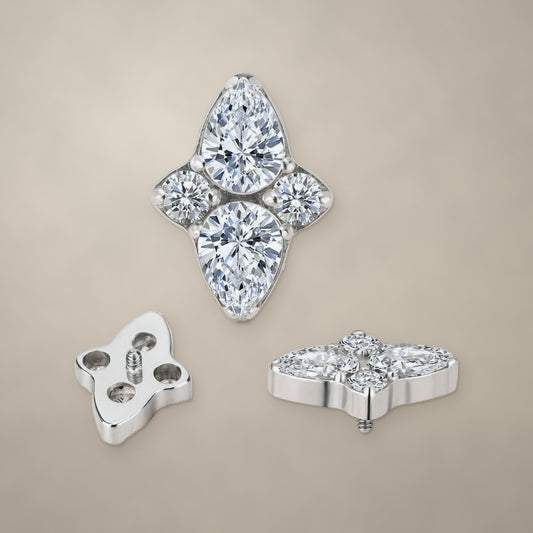Four-petal internally threaded end in titanium, shown from three angles