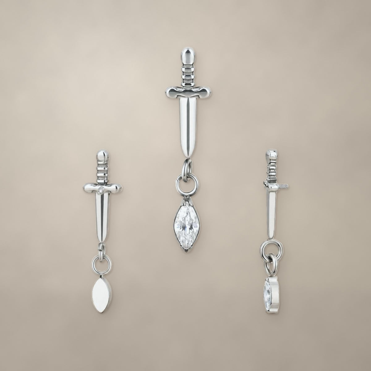 Dagger and marquise drop internally threaded end in titanium, shown from three angles
