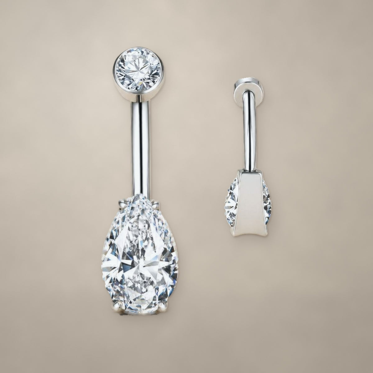 Pear drop internally threaded navel ring in titanium, shown from two angles