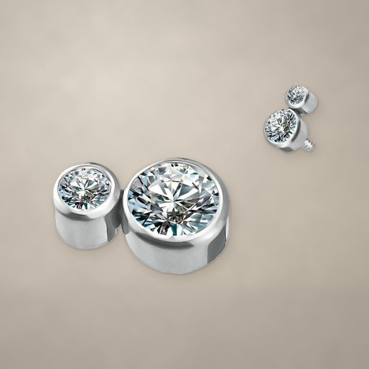 Round stone duo internally threaded end in titanium, shown from two angles