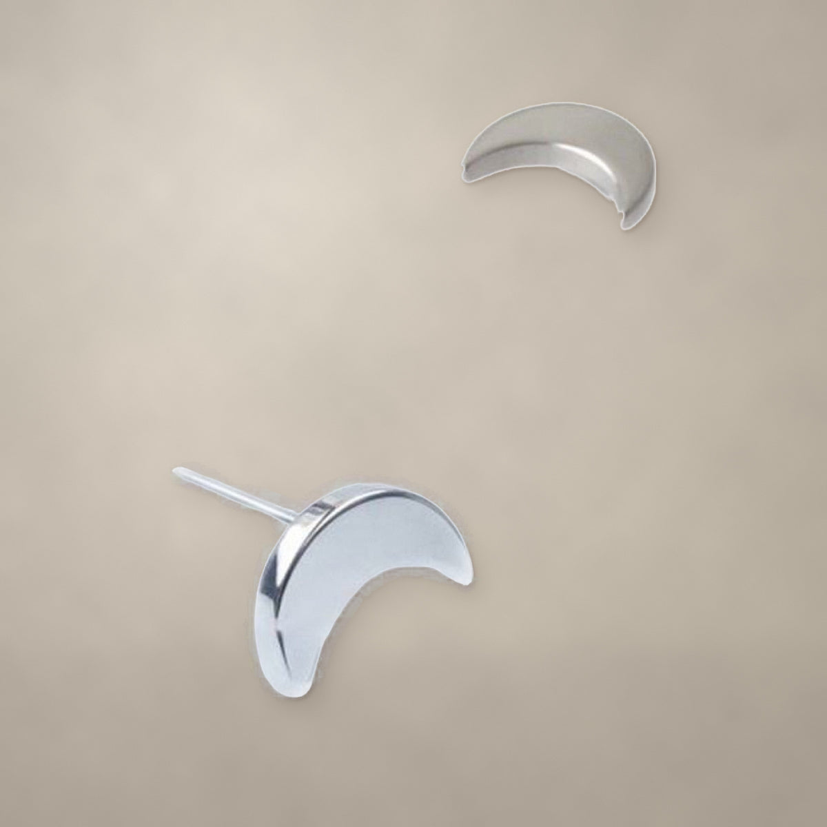 Crescent threadless end in titanium, shown from two angles