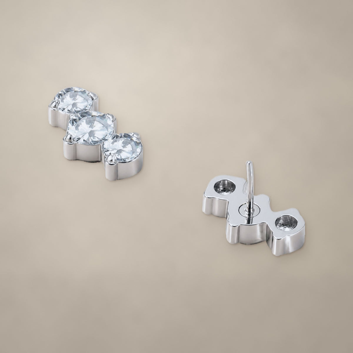 Three-round arc threadless end in titanium, shown from two angles