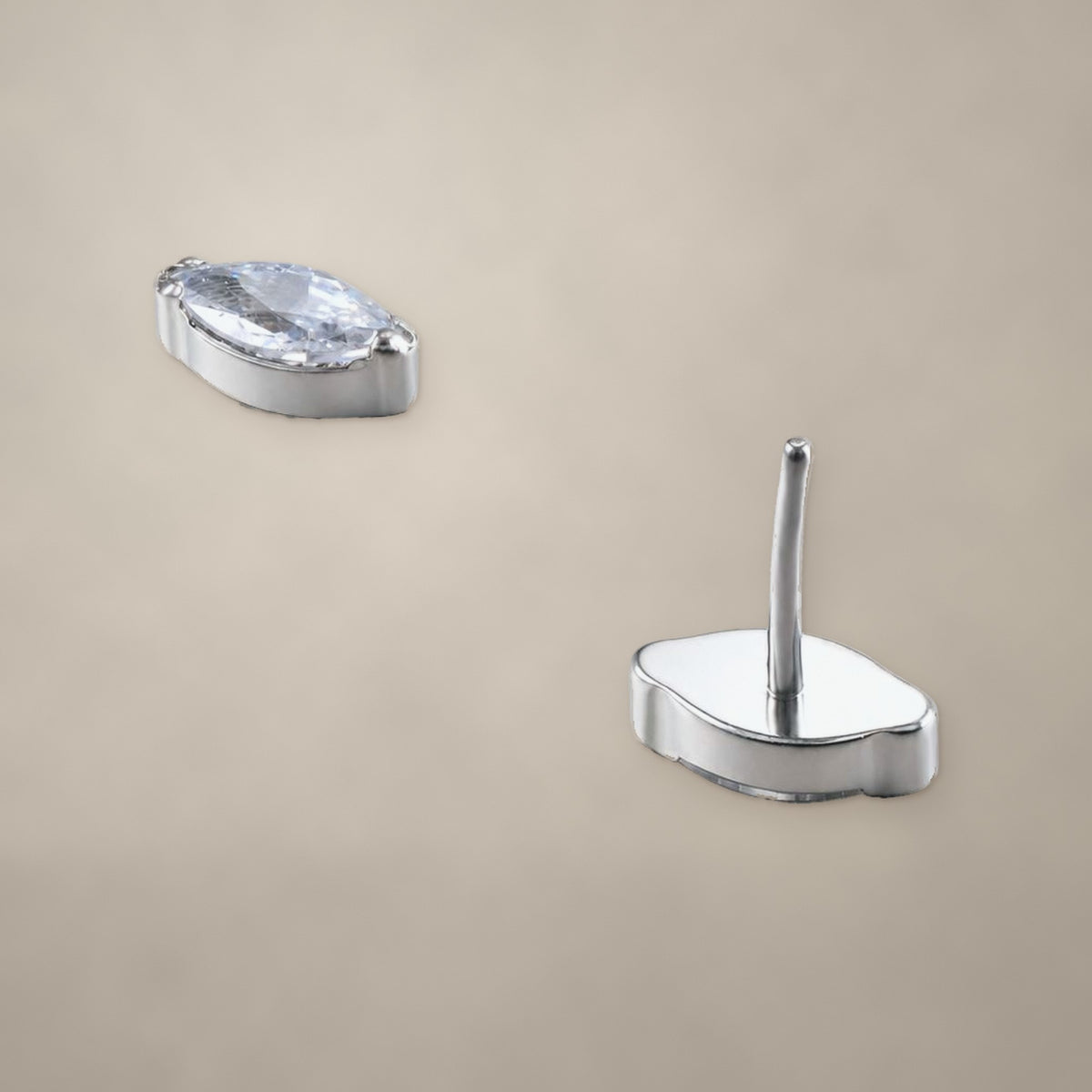 Marquise threadless end in titanium, shown from two angles