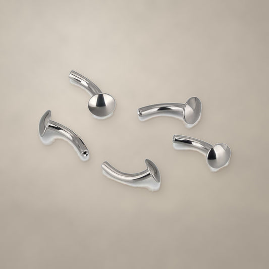 Flat-disc internally threaded curved barbell in titanium