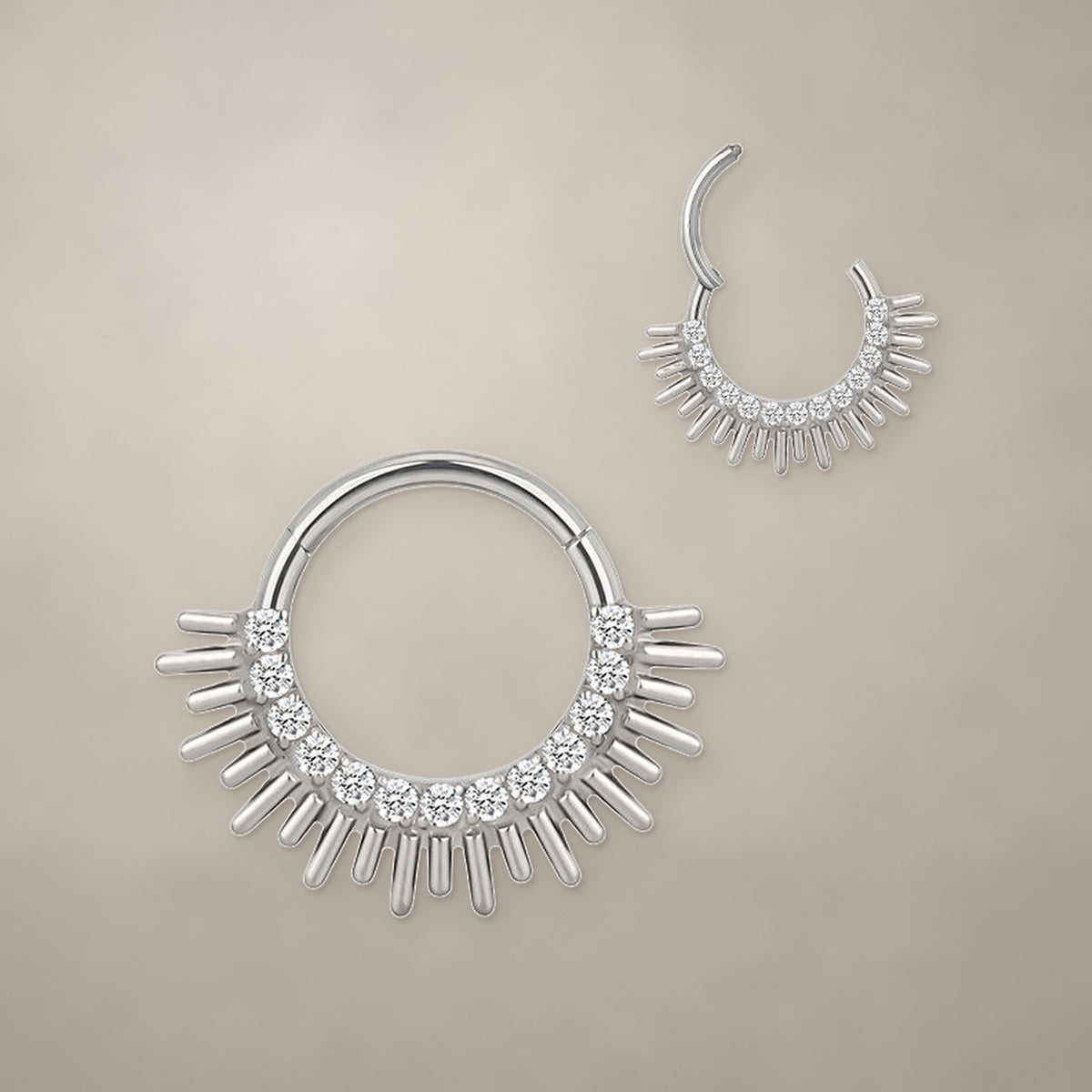 Sunburst titanium clicker ring (10 mm), shown closed and open