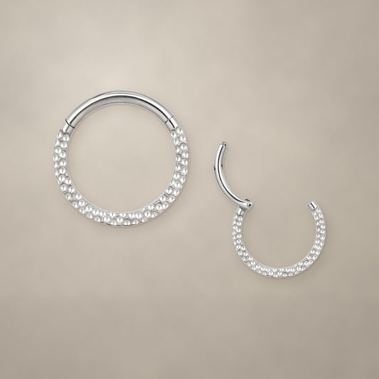 Textured titanium clicker ring (8 mm), shown closed and open